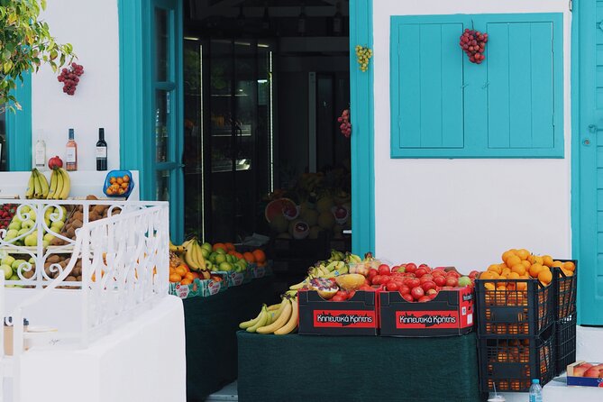 2 Hours Feel Like A Local Walking Tour in Mykonos Town - Mykonos Old Port: the best ending for food, shops, and people-watching