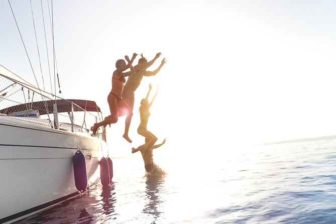 All inclusive Private Cruise: Delos &Rhenia island-free transport - Rhenia swim and snorkel time: clear water, bays, coves, and easy fun