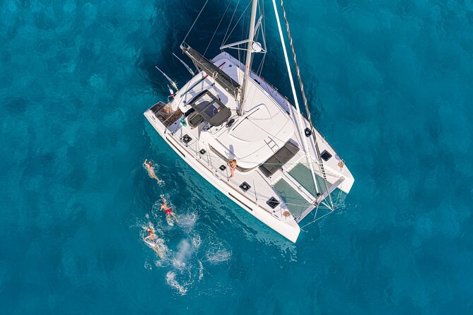 Catamaran Day & Sunset Cruises with meals Drinks and transportation - Rhenia’s Two-Hour Swim and Snorkel Stop (Plus the Meal On Board)