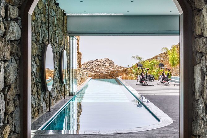 Exclusive Wellness Day Experience in Mykonos - Relaxation Pool and Jacuzzi Time: Sunbathing With a Plan