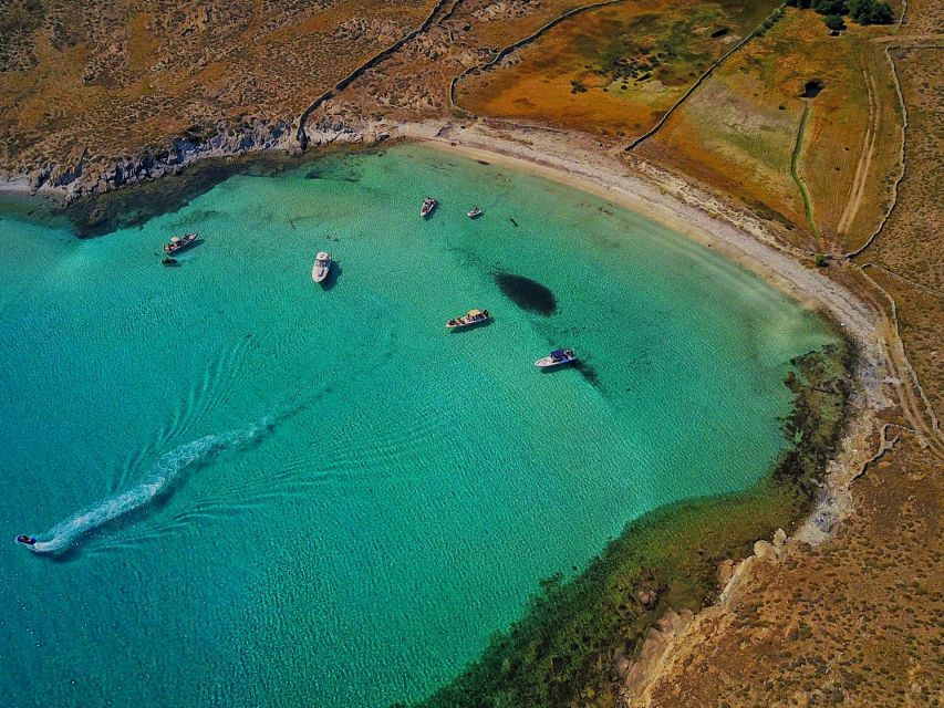 From Ornos: Private Cruise Mykonos to Delos & Rhenia Island - Boat-only comfort: snacks, Wi‑Fi, towels, and included gear