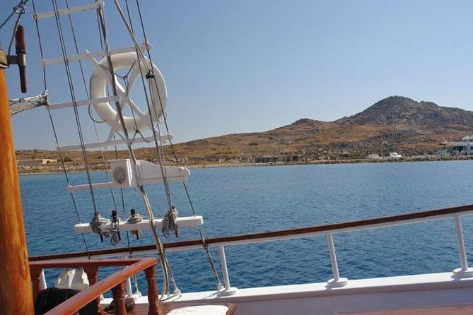 Full-Day Delos and Rhenia Island Cruise from Mykonos - Getting on the boat: pickup, meeting point, and timing