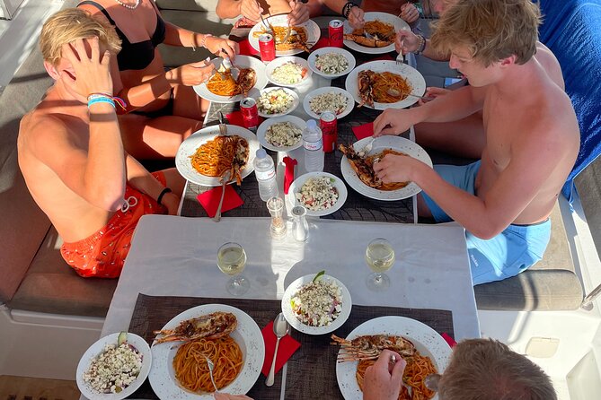 Full Day Discovering Mykonos Delos Renia Tour by Boat - Dimitri and Mohammed: The Crew Makes the Day
