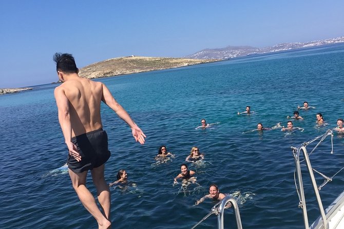 Full Day Private Yacht Cruise in Mykonos on a Ferretti Altura 52s - Included on Board: Food, Drinks, Towels, and a Crew Who Runs the Day