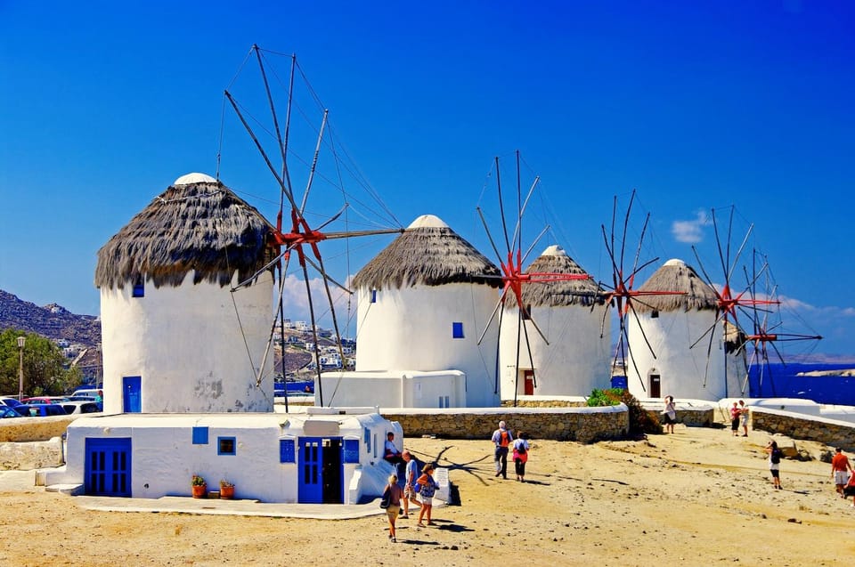 Iconic Mykonos: A Guided Walking Tour of Highlights - Manto Mavrogenous Statue stop: first photos and a quick orientation