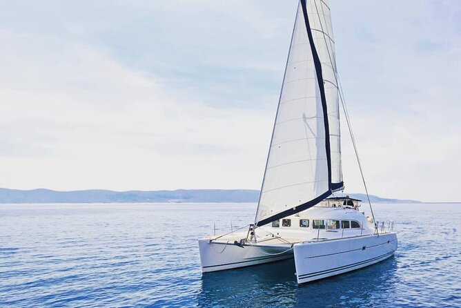 Morning and Sunset Cruise with Meal and Transport Included - Life on a modern catamaran: skipper, crew, and comfort
