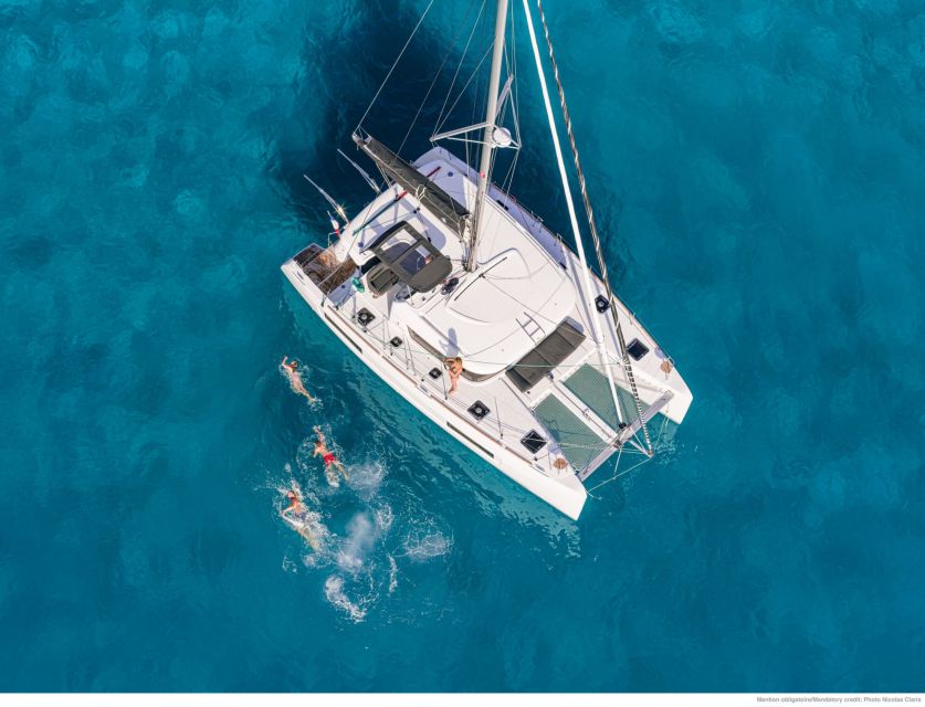 Mykonos: Catamaran Cruise with Lunch, Drinks and Transfer - Delos from the water: what you see without the hike
