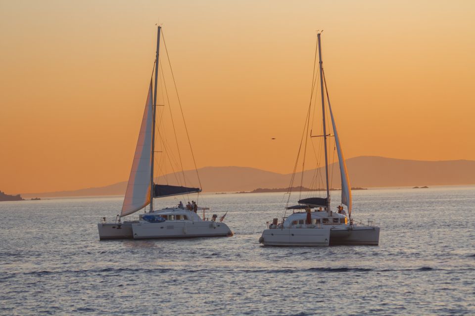 Mykonos: Catamaran Cruise with Lunch, Drinks and Transfer - The ride back: Mykonos views, windmills, and possible sunset magic