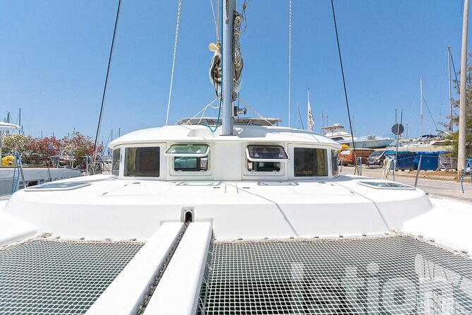 Mykonos Catamaran Cruise with Meal Drinks and Sup - A catamaran day that actually helps you avoid the crowds