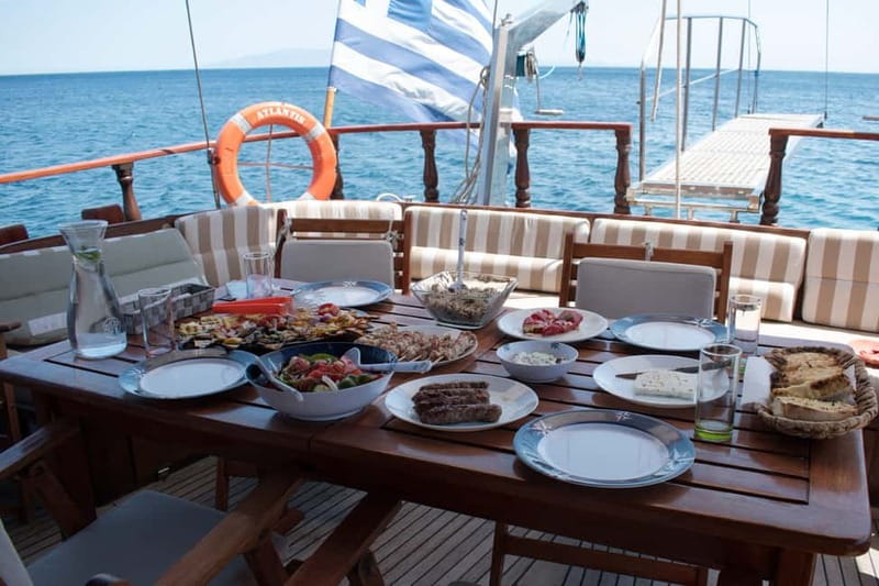 Mykonos: Delos and Rhenia Islands Cruise with BBQ Meal - Boat Comfort, Shade, WiFi, and the Wind Factor