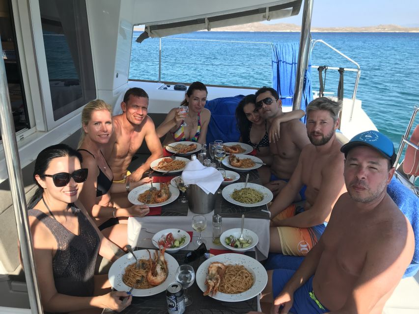 Mykonos: Full-Day Catamaran Cruise with Fresh Lunch - Lunch and drinks onboard: easy, included, and actually convenient