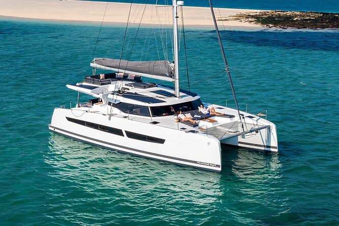 Mykonos: Luxury Catamaran Cruise with Meal, Drinks & Transport - Aboard the White Coral or Aerial: what the boat experience feels like