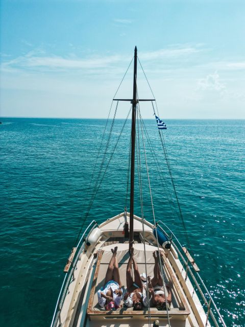 Mykonos: Private Cruise by Wooden Boat with Snorkeling - Key highlights you’ll care about