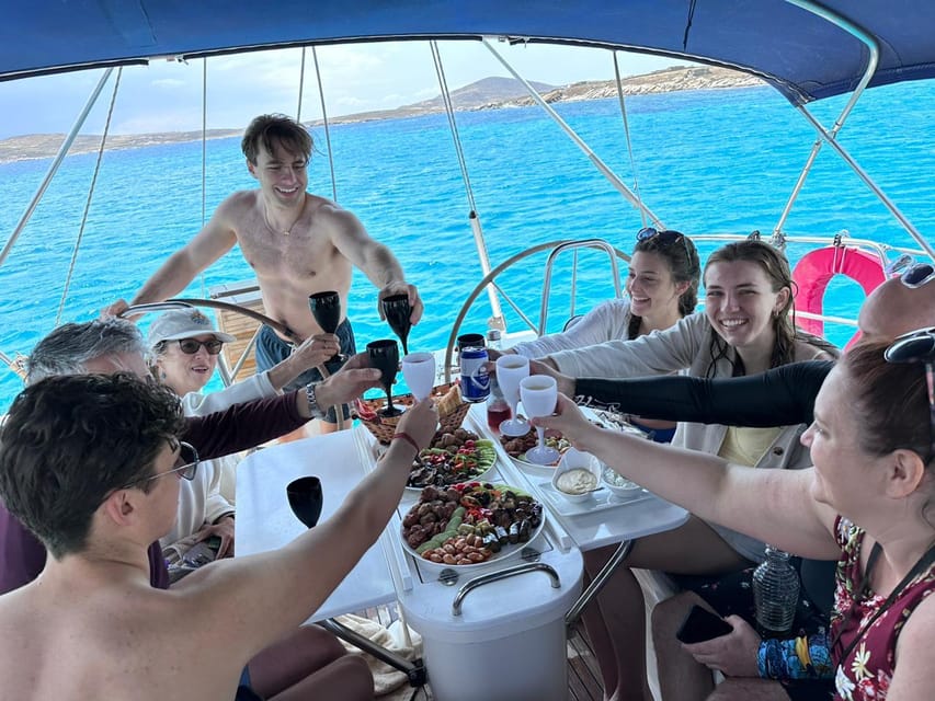 Mykonos: Rhenia Island Sunset Cruise with Transfer and Meal - The Sunset Setup at Little Venice (30 Minutes of Magic)