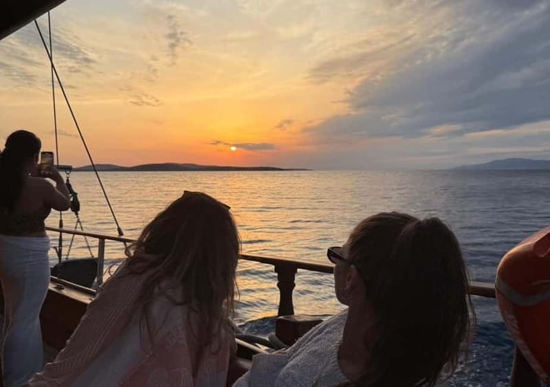 Mykonos: Sunset Boat Cruise with Light Dinner & Drinks - Boat setup, crew style, and the barefoot rule