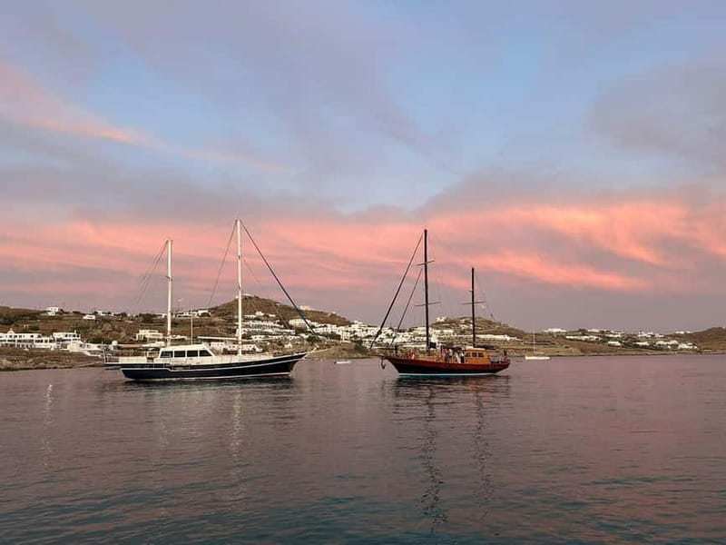 Mykonos: Sunset Boat Cruise with Light Dinner & Drinks - Transfers, timing, and how to avoid losing the best light