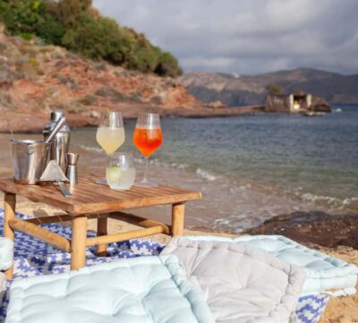 Mykonos: Sunset Cocktail Making Class on a Secluded Beach - Where it happens (and why it matters): weather-based beach location
