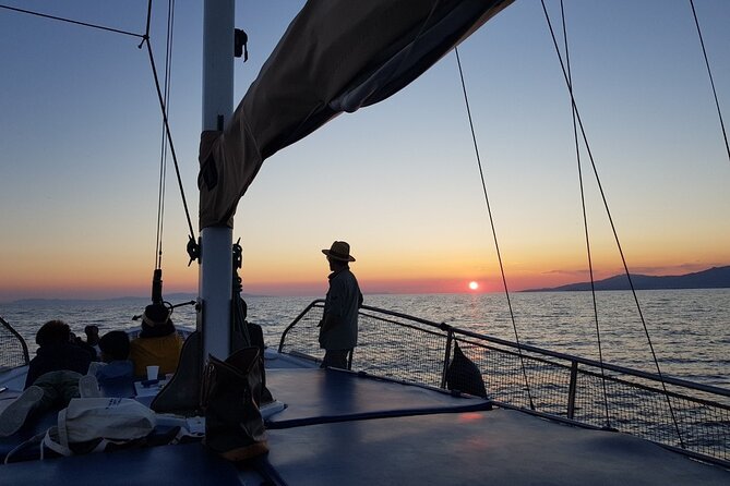 Mykonos Sunset Cruise with Drinks - Boat reality check: older deck, small ride, possible chop