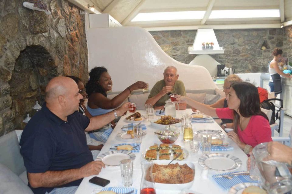 Mykonos: Traditional Lunch or Dinner at the Mykonian Spiti - Entering the Mykonian Spiti: family welcome, not a scripted show