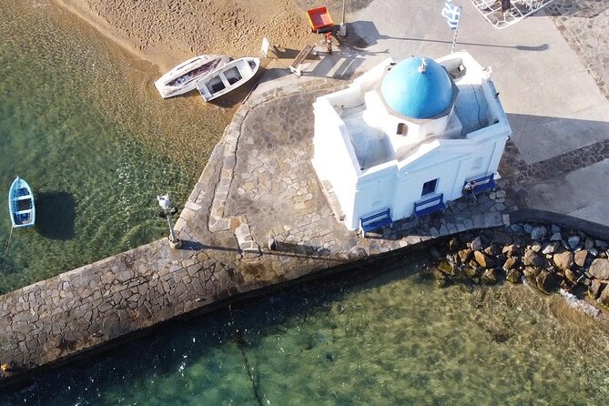 Private 4 Hour Tour Explore the Authentic Mykonian Essence - Agios Sostis Beach and chapel: calmer coastline time