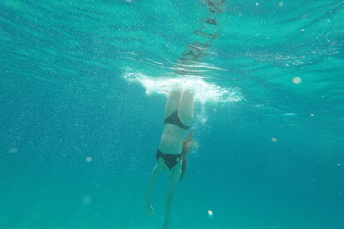 Private sailing cruise to Delos & Rhenia with Lunch & Transfer - Rhenia Island: Four Beaches, Protected Coves, and Time to Actually Swim