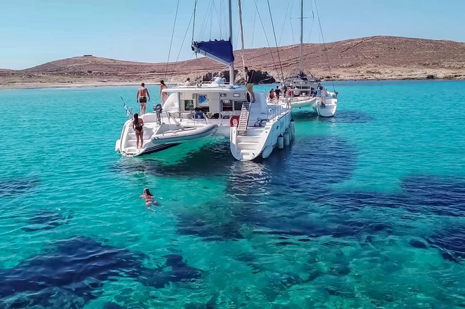 Private Sunset Cruise Including Meals And Drinks - Sunset off Mykonos: Little Venice and the windmills from sea level