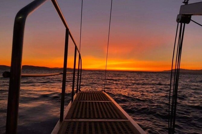 Sunset South Coast Sail Cruise with lunch,drinks, optional transfer - Barefoot Boarding and Choppy-Water Reality (The Main Caution)